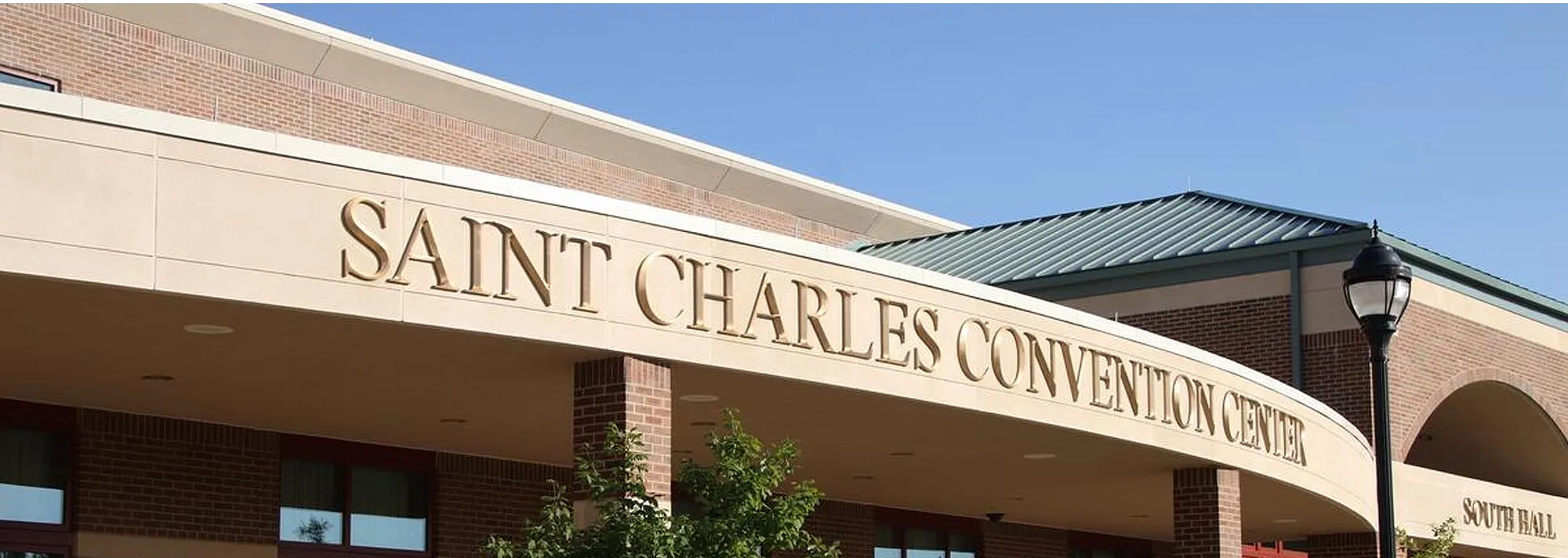 The Saint Charles Convention Center facade with its lettered stone banner